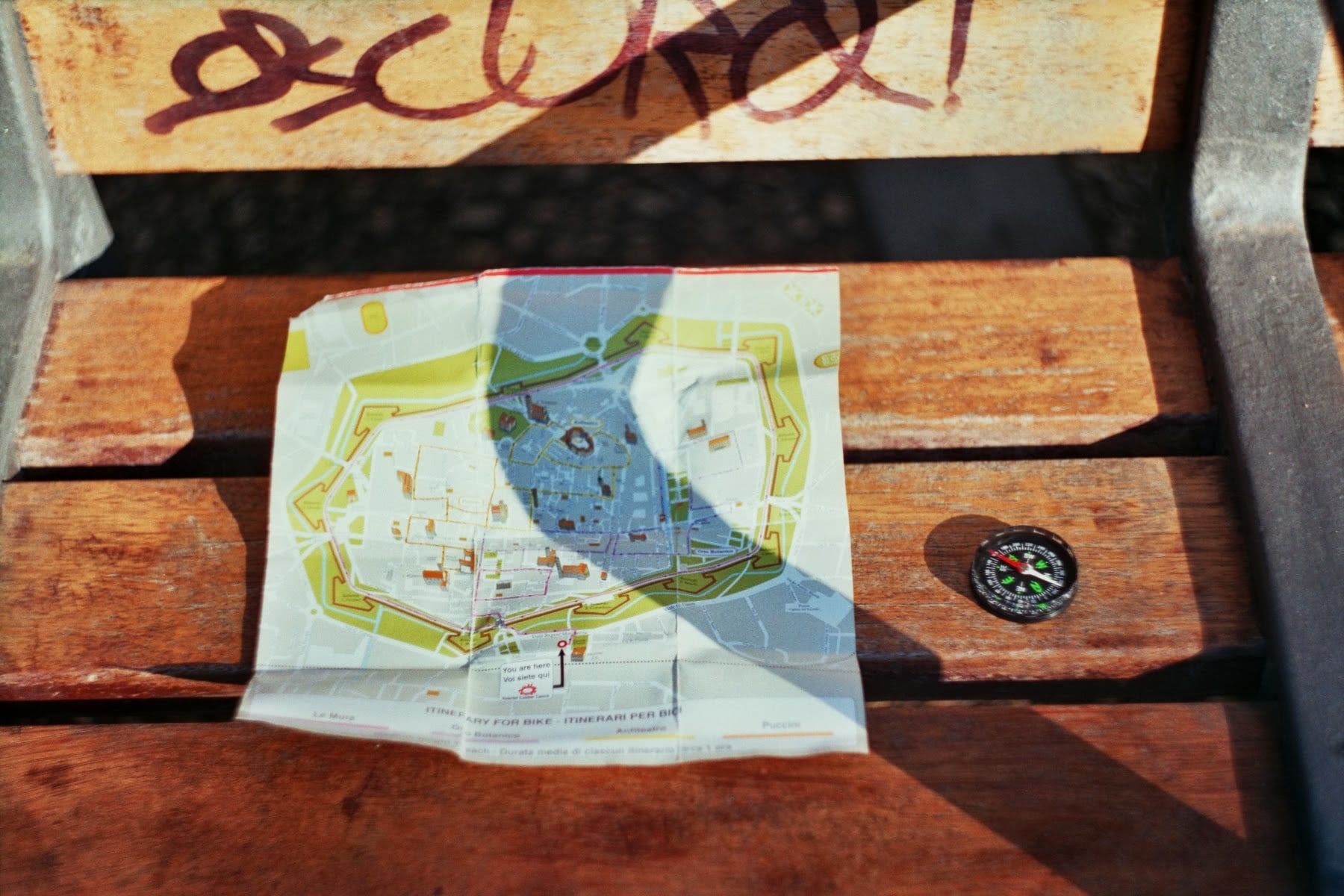 The map of Lucca city and compass