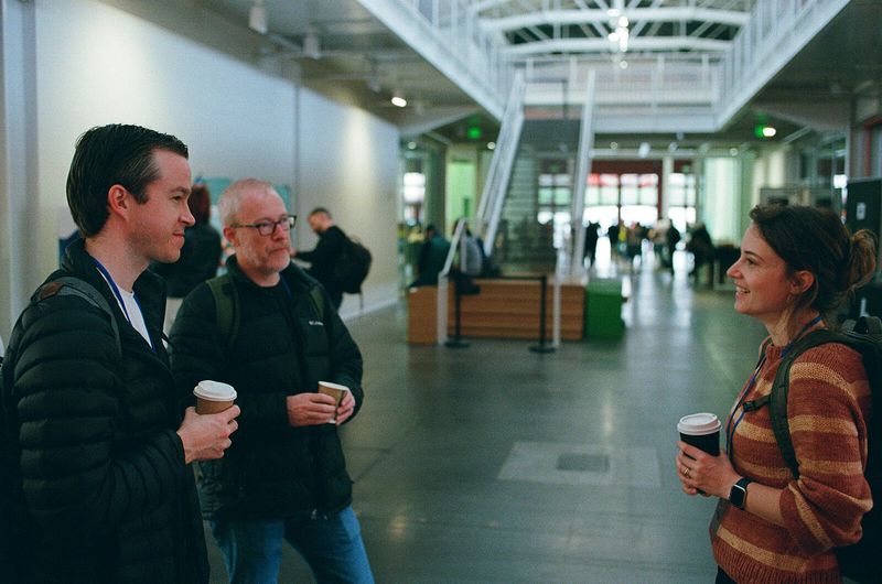 Conference attendees talking