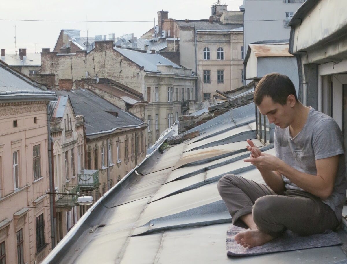 Andrey Sitnik sitting on the roof